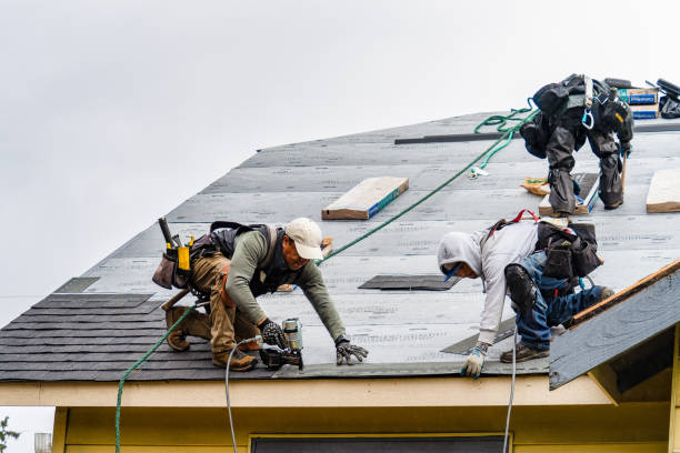 Professional Roofing technician working in Union Springs, NY